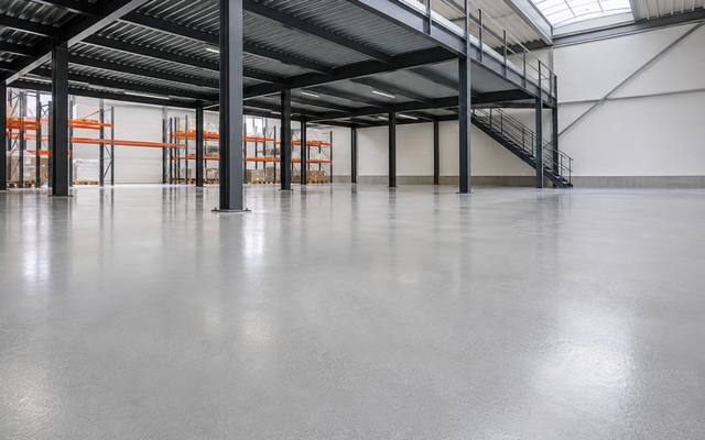 Epoxy floor under a warehouse mezzanine in Kingston, Ontario
